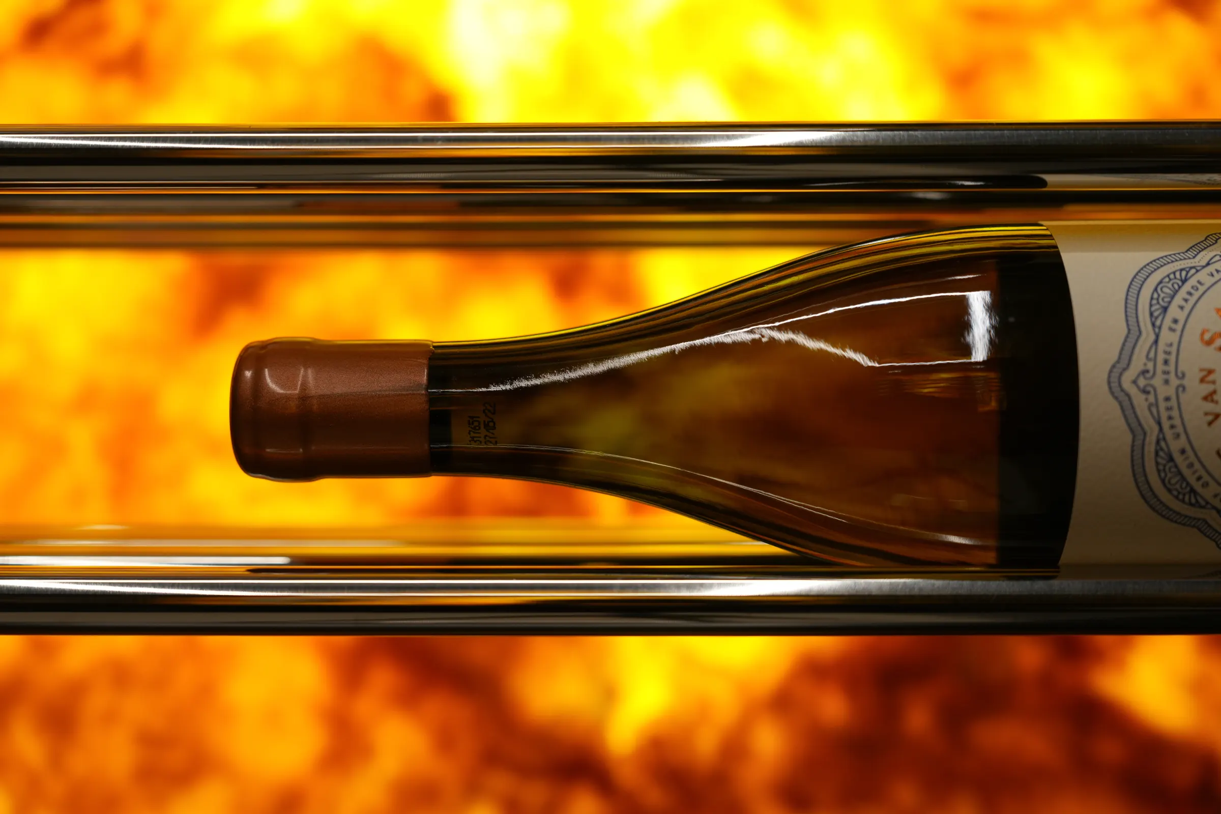 A bottle resting on lit onyx