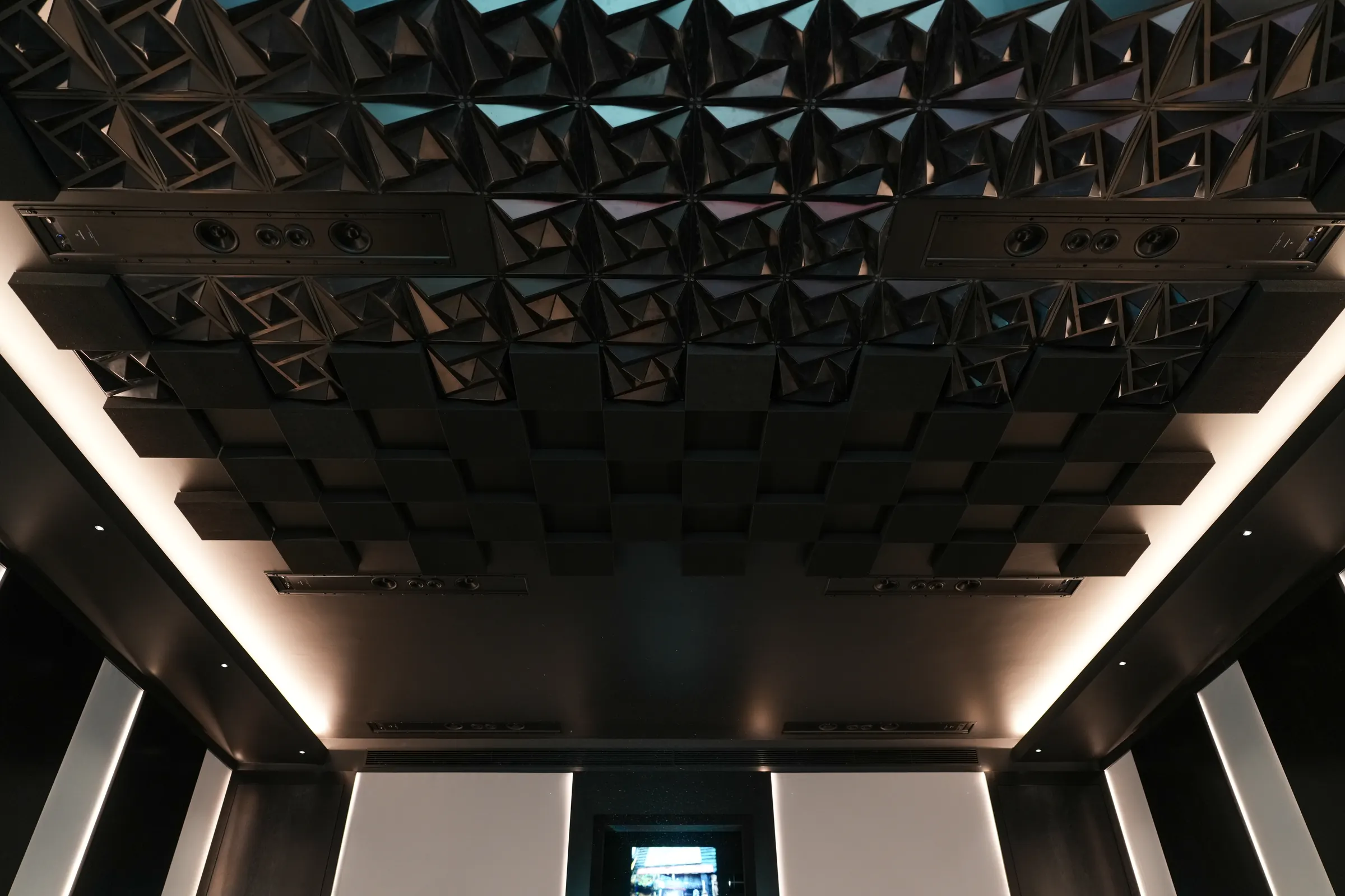 The cinema's sculpted acoustic ceiling